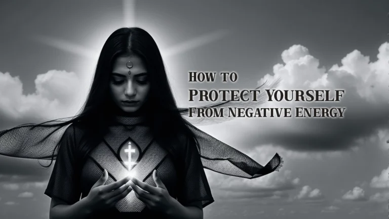 A mysterious woman dressed in dark spiritual attire stands against a cloudy sky, holding a glowing cross of light in her hands. She has a serene yet powerful expression, with a third-eye symbol on her forehead, symbolizing spiritual protection and energy shielding. The wind moves through her flowing cape, adding a mystical aura to the scene. The text beside her reads 'How to Protect Yourself from Negative Energy,' emphasizing the theme of spiritual defense.